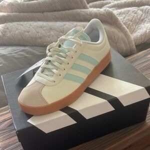Adidas White Sneakers with Blue Stripes